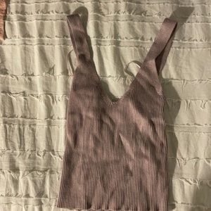 Debut sweat tank size M/L but runs very small more like a size S